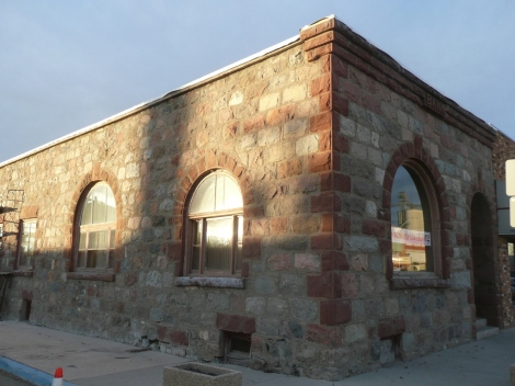 The sun shines on the Stone Bank restoration in Bottineau, ND.